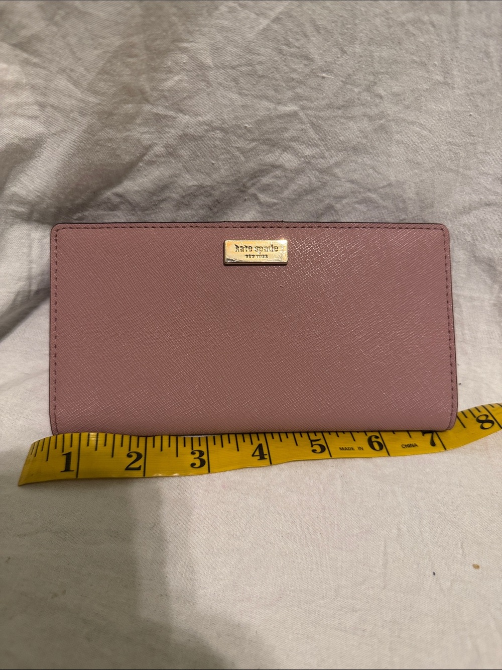 kate spade rose pink Saffiano leather continental wallet with gold plaque